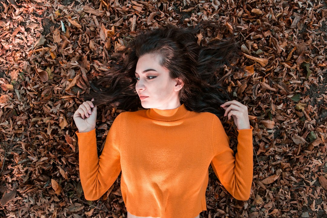 Editorial cover illustration showing fall hair color trends 2026 across copper, beige blonde, mocha brunette and cherry cola palettes