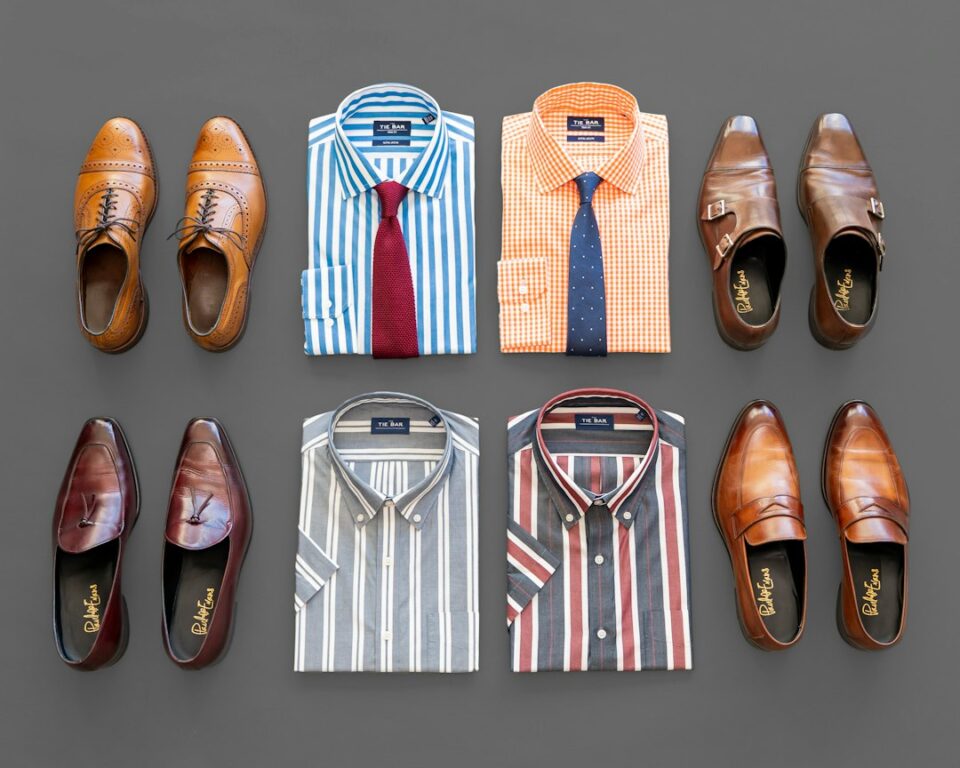 Cover illustration of men's wardrobe essentials in a modern closet